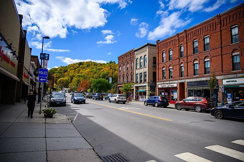 Rustic buildings lined along a street in the downtown area of Montpelier, Vermont.