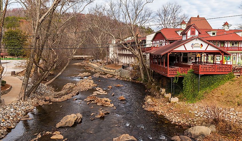 Aerial view of the Chattahoochee river and buildings on its shore in Helen, Georgia