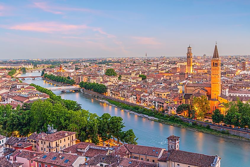 Verona city downtown skyline, cityscape of Italy at sunset (Credit: f11photo via Shutterstock)