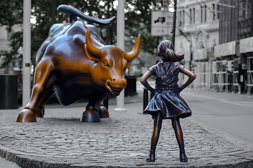 New York, USA: The Fearless Girl statue facing Charging Bull in Lower Manhattan. Image Credit quietbits via Shutterstock.