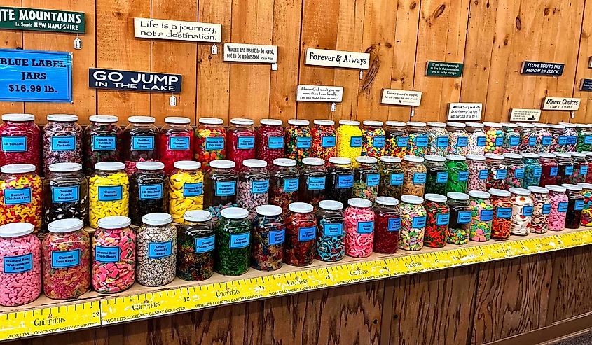 Colorful candy jars on shelf, world's longest candy counter. 