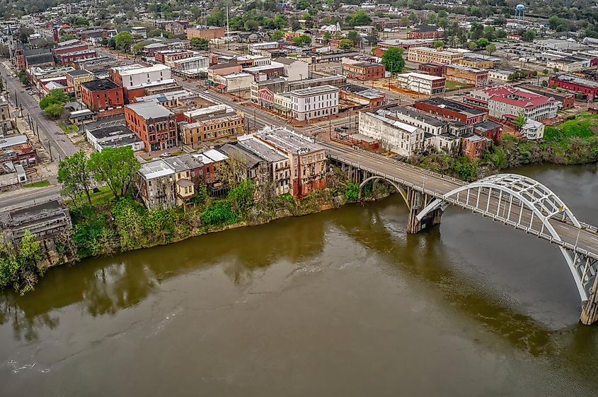 Aerial view of Selma, Alabama, showcasing the town's historic architecture, streets, and the iconic bridge spanning over the river.