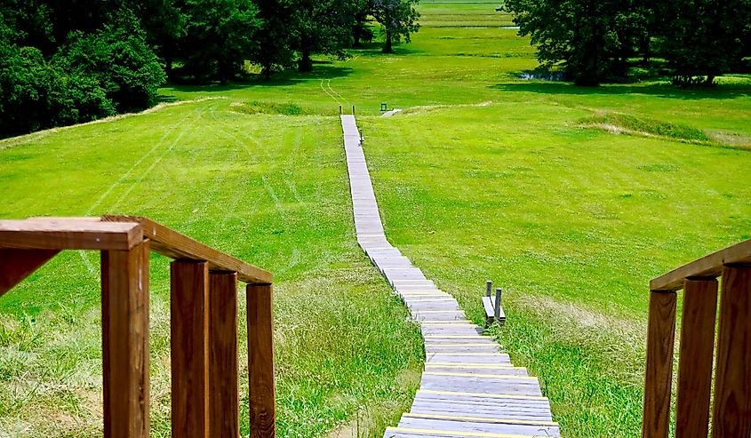 Poverty Point World Heritage Site in Louisiana is a prehistoric monumental earthworks site constructed by the Poverty Point culture. Boardwalk stairs descending the largest earthen mound - Mound A.