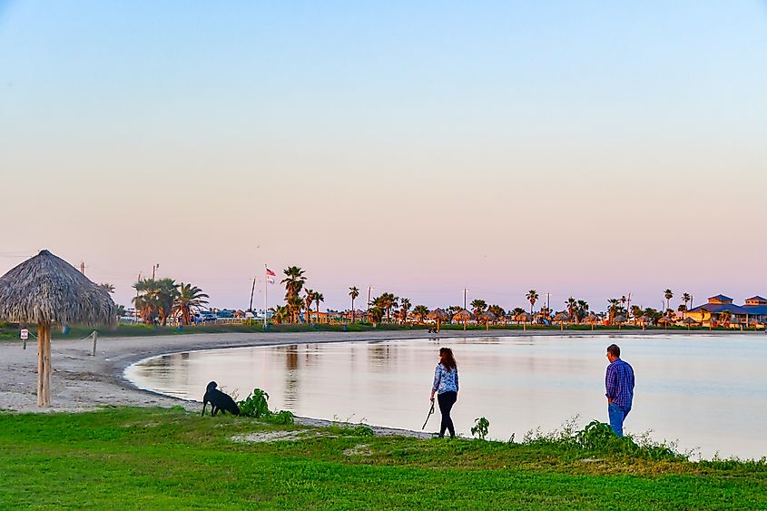 People enjoying sunset time at a beach in Rockport, Texas.