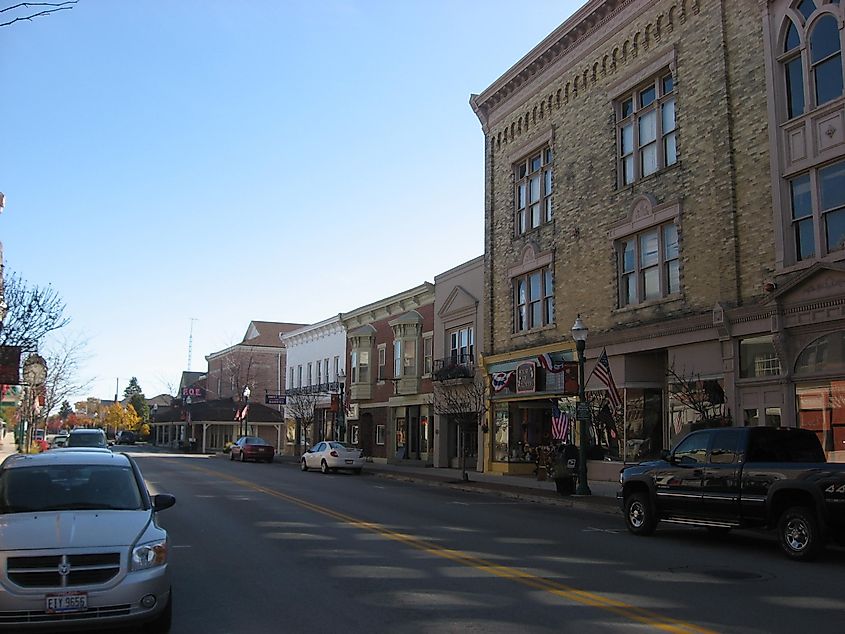 Buildings on the southern side of the 100 block of East Main Street (State Route 47) in downtown Versailles, Ohio, United States.