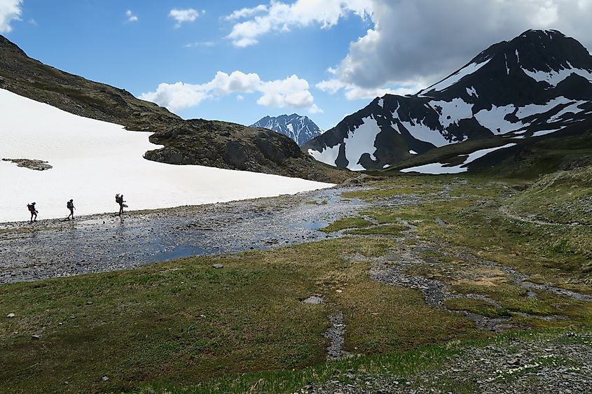 Pond created by melting snow near the summit of Crow Pass trail, Anchorage, Alaska