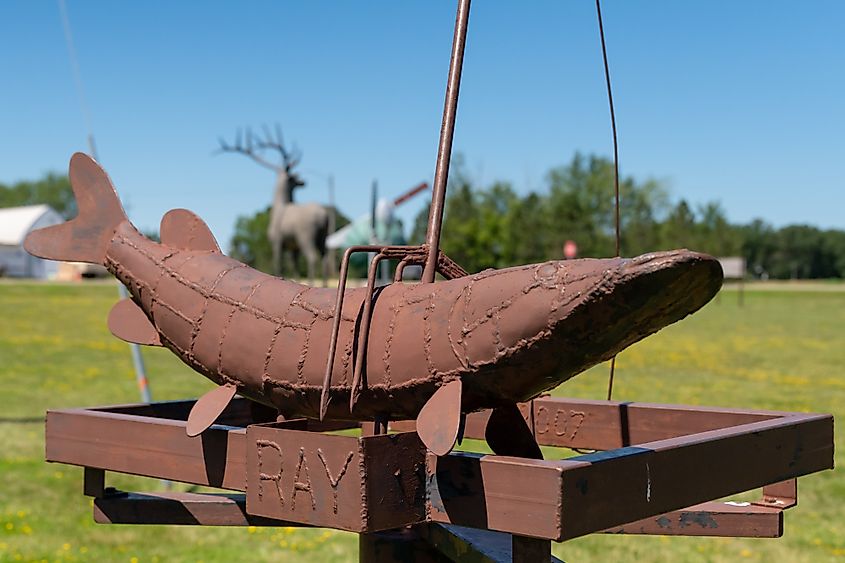 Metal sculpture of a Northern Pike fish with a spear through it in Vining, Minnesota.