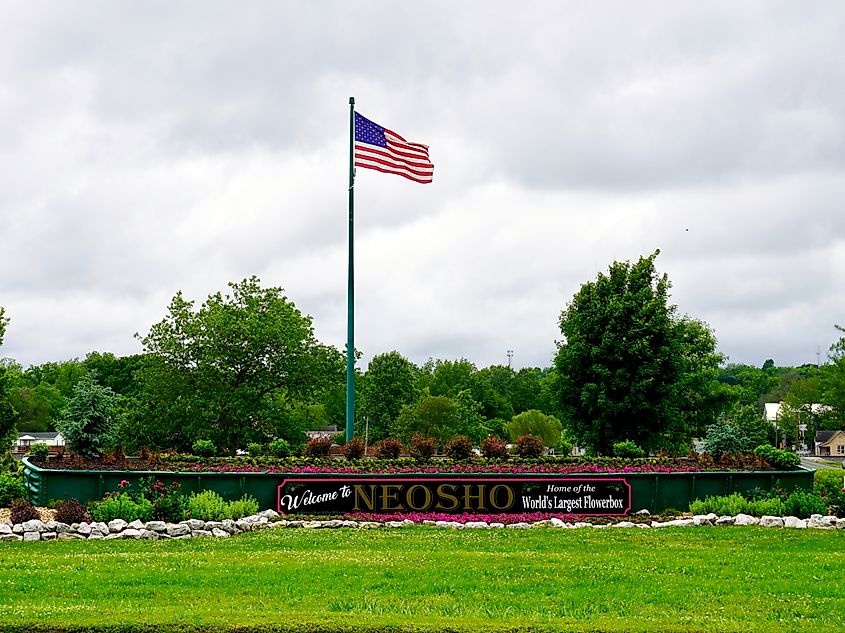 The world's largest flower box and an American flag in Neosho, Missouri.