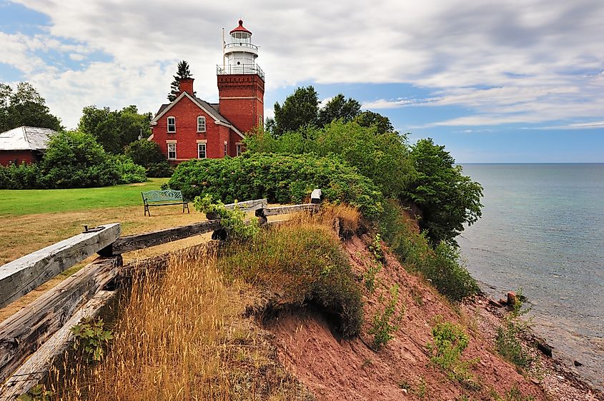 Big Bay Lighthouse in Big Bay, Michigan, perched on a cliff overlooking Lake Superior