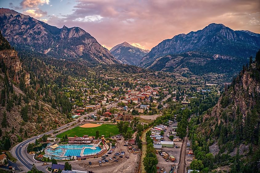 Tourist mountain town of Ouray, known for its Hot Springs Aquatic Center, set against the San Juan Mountains.