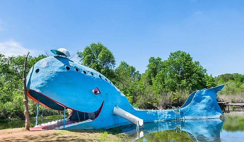 Iconic Blue Whale floating in "Natures Acres" pond, on Route 66.