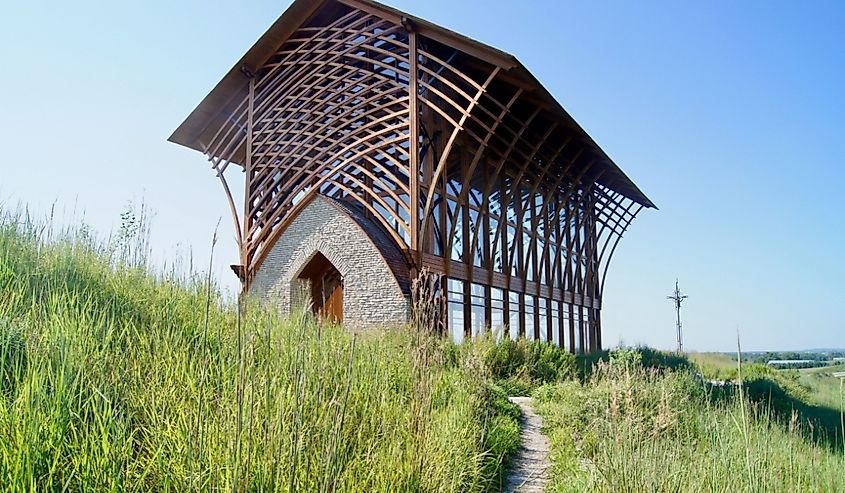 A horizontal image of the exterior wood supports of the iconic glass-walled Holy Family Shrine