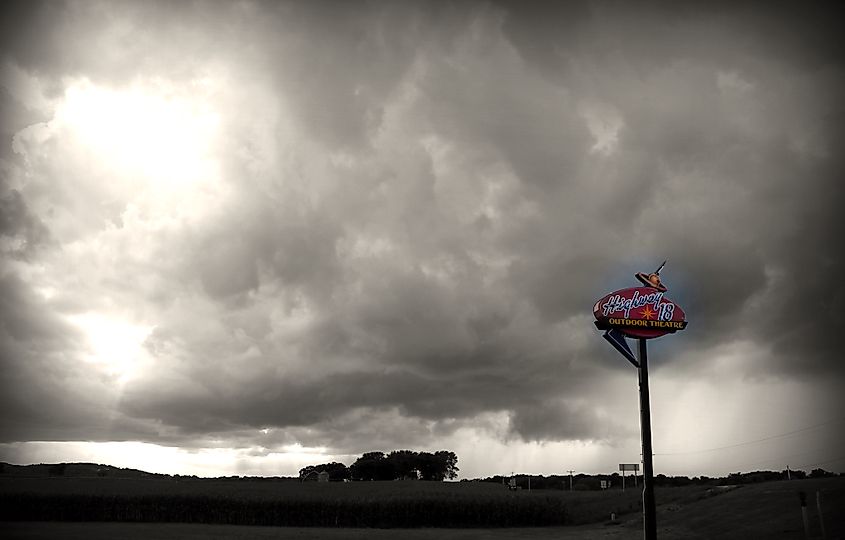 Storm clouds roll in near the Highway 18 Drive In Movie Theater.