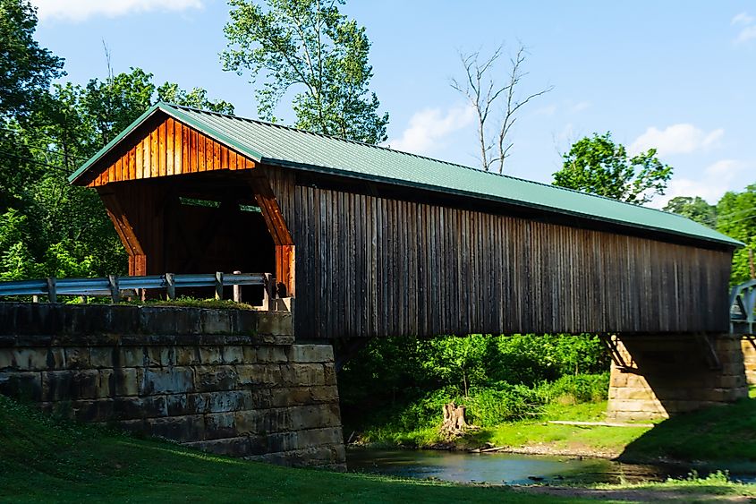 Editorial Photo Credit: James W. Thompson via Shutterstock. The Otway Covered Bridge, located outside the small town of Otway, Ohio.