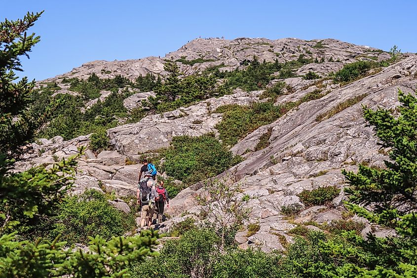 Hikers ascending Mount Monadnock near Peterborough.