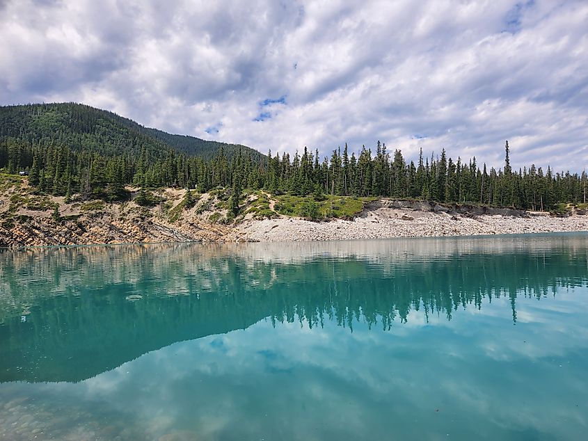 Calm lake reflection in Nordegg, Alberta.