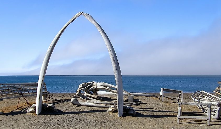 The iconic Whalebone Arch next to the Arctic Sea on a sunny summer day.