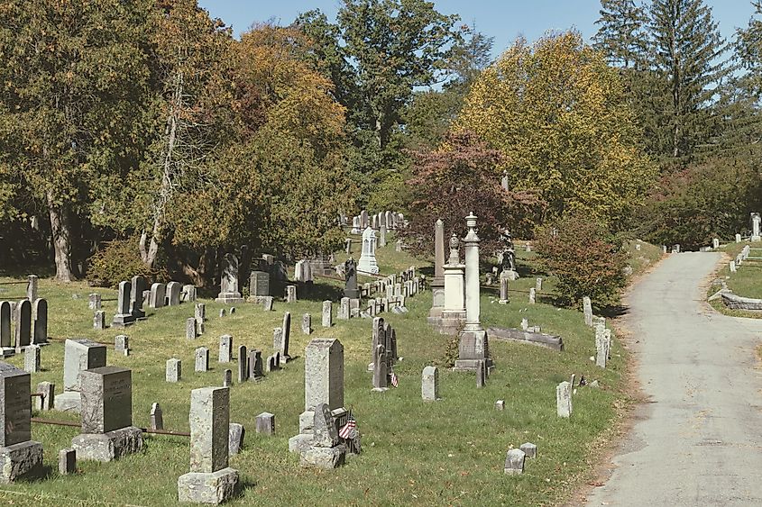 Sleepy Hollow Cemetery with Old Tombstones and Colorful Trees during Autumn