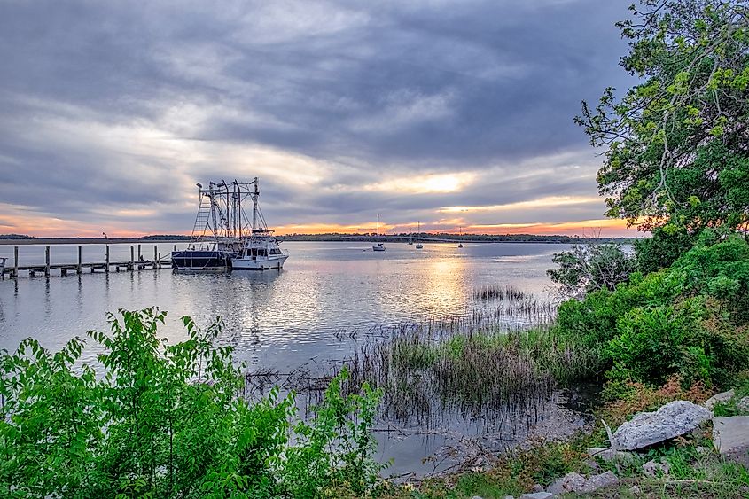Fishing boats docked at a pier in Port Royal, South Carolina.