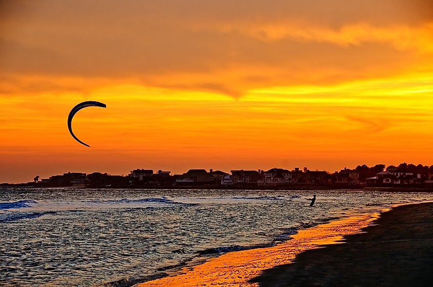 A kiteboarder at sunset on Isle of Palms, South Carolina.