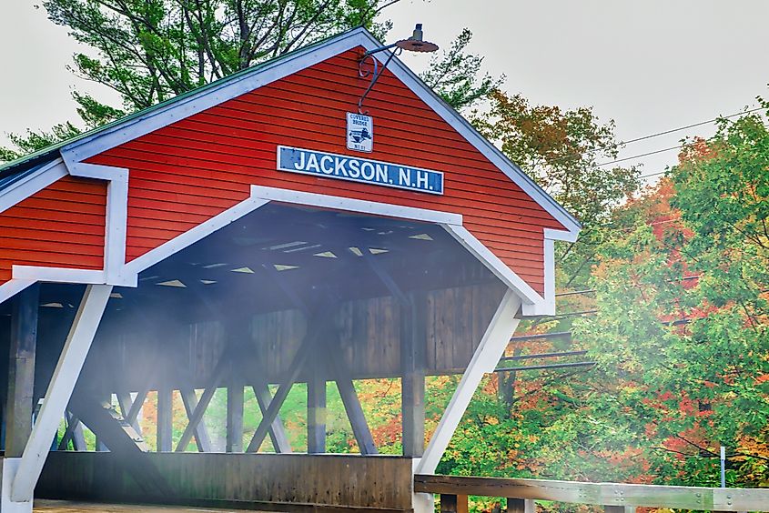 Jackson Covered Bridge in New Hampshire, foliage season colors.