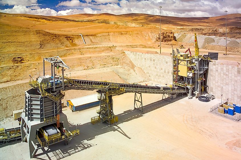 Rock crusher and conveyor belt at the plant of a copper mine in the altiplano of the Atacama Desert in northern Chile.