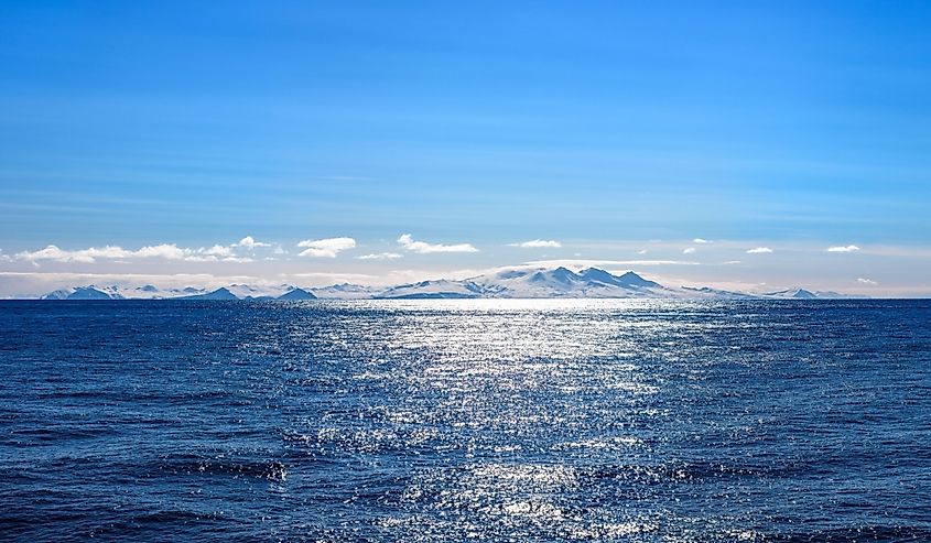 Snow peaks, glaciers and rocks of Aleutian Islands