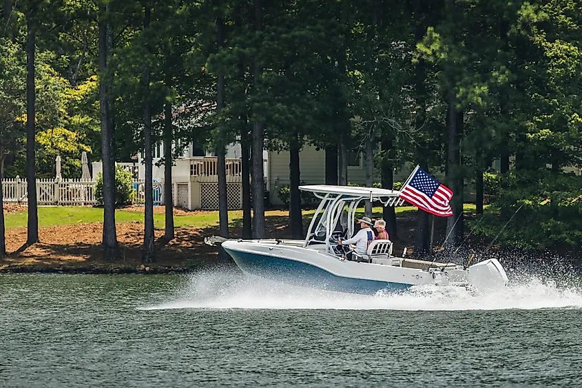 Greensboro, Georgia: Boaters on fishing boat enjoy summer day on the lake