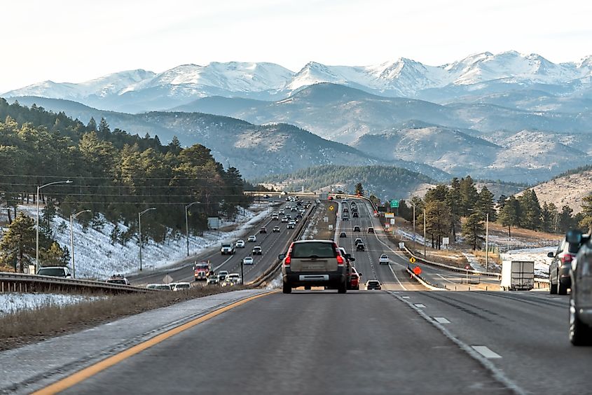 Leaving Denver on I-70 with mountains in the distance.