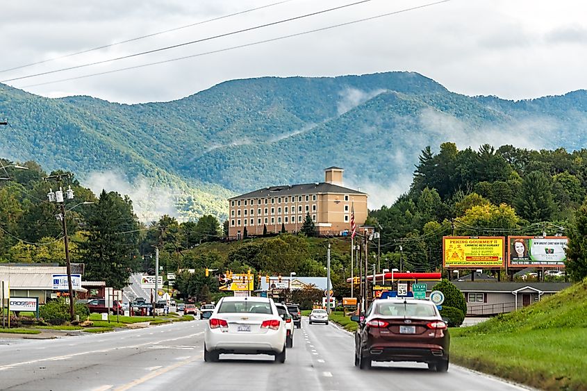 Road leading to downtown Sylva, North Carolina, with Smoky Mountain mist in the Blue Ridge Mountains cityscape.