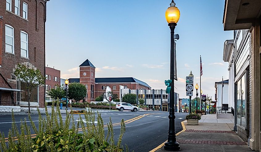 A car is turning on the roundabout around downtown fountain in a square in Somerset, Kentucky.