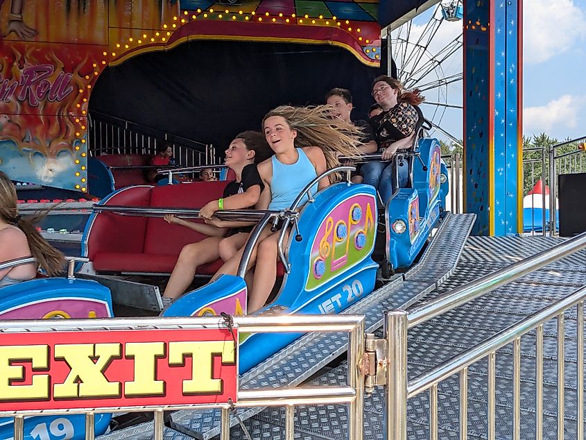 New Paltz, New York: Fast-moving amusement ride at Ulster County Fair. Image Credit Michael LaMonica via Shutterstock.