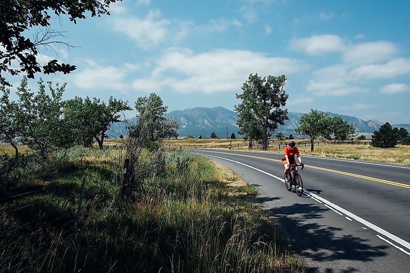 Woman riding a bike near Boulder in Colorado.