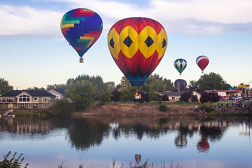 Giant balloons flying over the Yakima River in Prosser, Washington