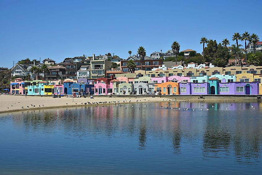 Landscape with scenic lagoon view of the Mediterranean Revival colorful Venetian Court at Capitola Beach in Santa Cruz, California, via Eleni Mavrandoni / Shutterstock.com