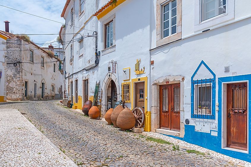 Narrow, medieval streets and white houses in Estremoz, Portugal.