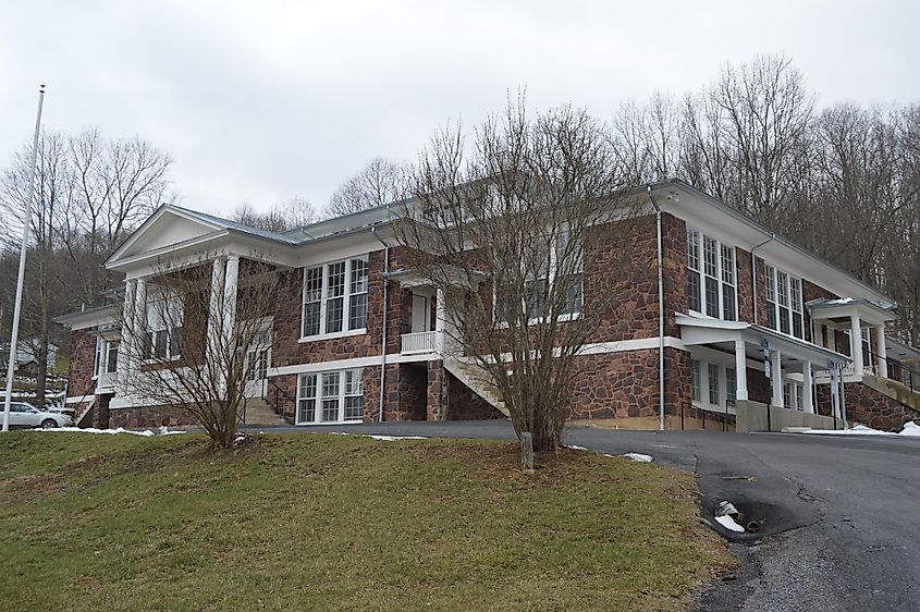 Front and northeastern side of the former Monterey High School, now known as the Highland Center, a community center located on Spruce Street in Monterey, Virginia, USA.