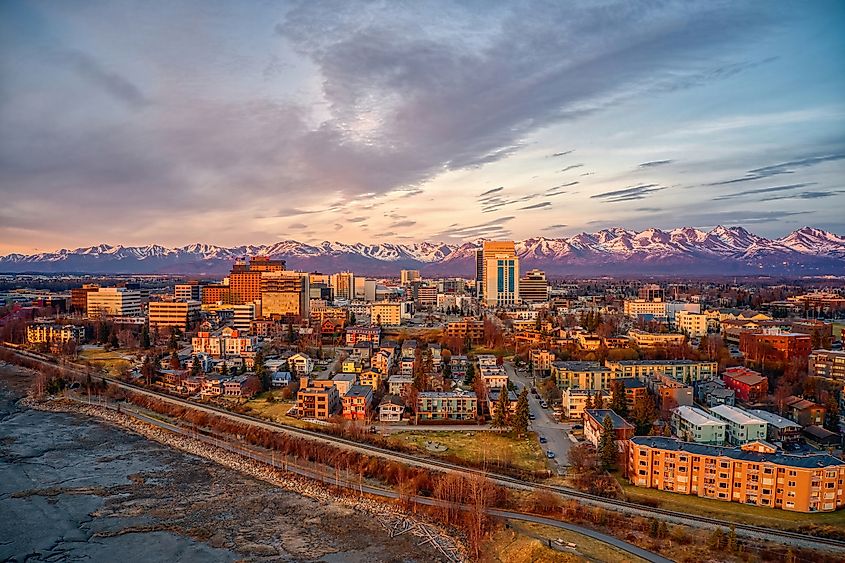 Sunset over downtown Anchorage, Alaska, with the Chugach Mountains in the background.