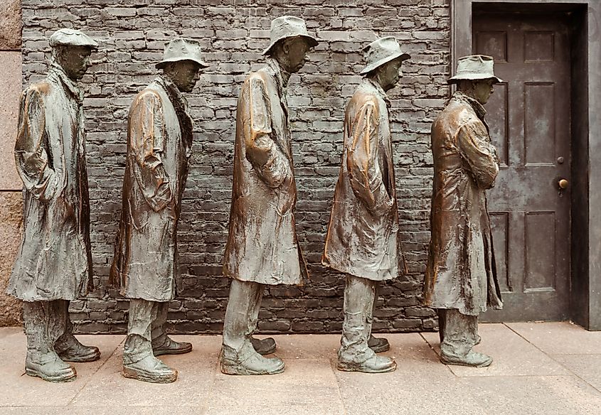 A sculpture depicting people waiting in a bread line from the Great Depression