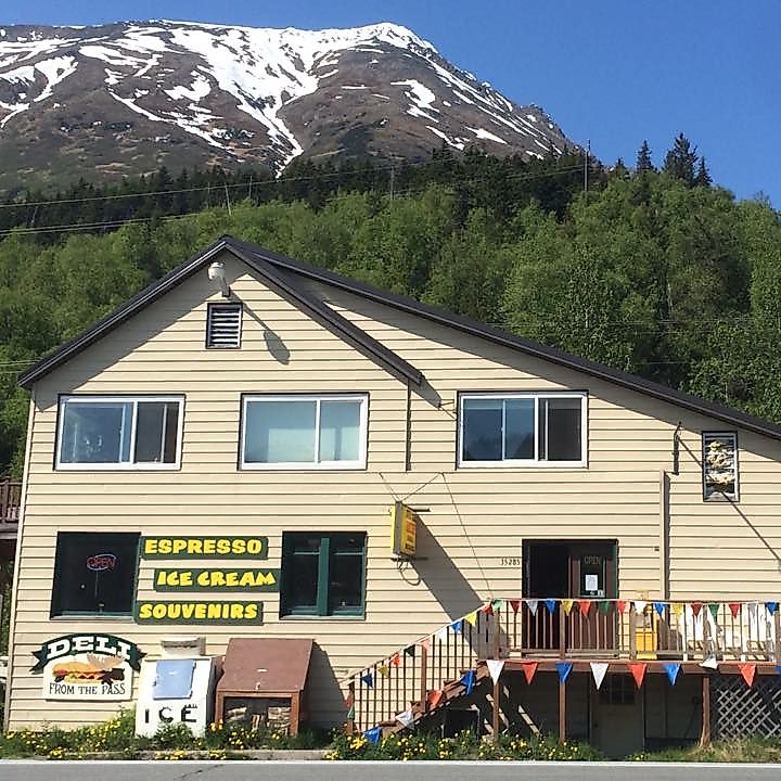Estes Brothers Grocery in Moose Pass, Alaska, a small wooden building on the Seward Highway.