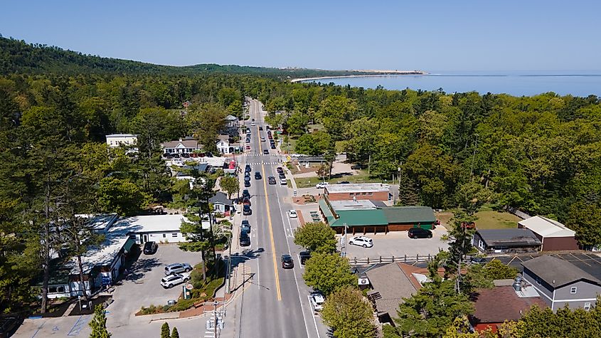 Aerial view of scenic M22 as it runs through downtown Glen Arbor with Sleeping Bear Dunes National Park