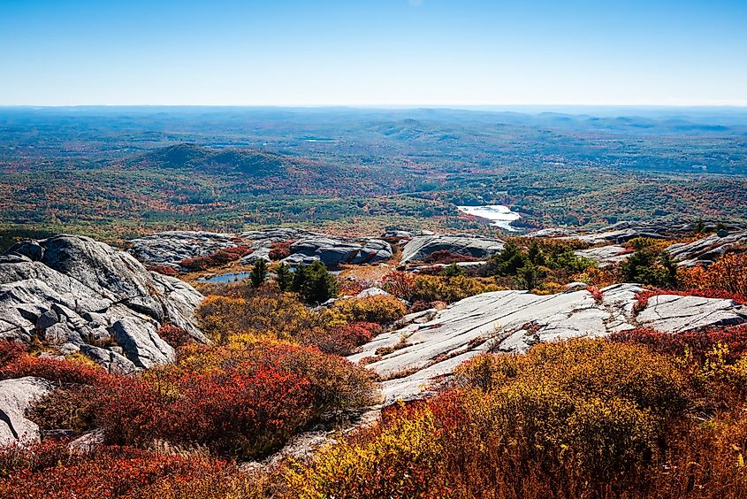 View of New Hampshire forests and bushes seen from the summit of Mount Monadnock