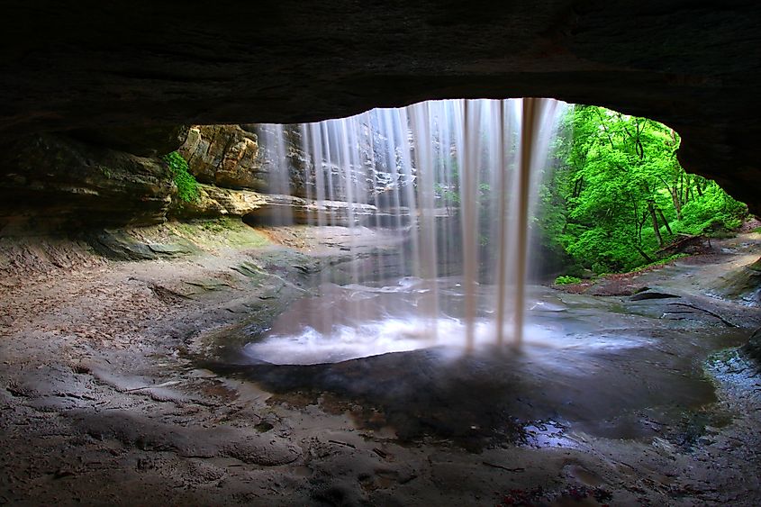 Rock overhang frames Lasalle Falls of Starved Rock State Park in central Illinois