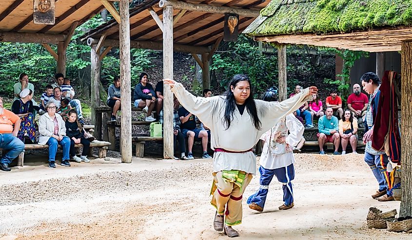 Cherokee man in Oconaluftee Indian Village shows ancient Cherokee dances.