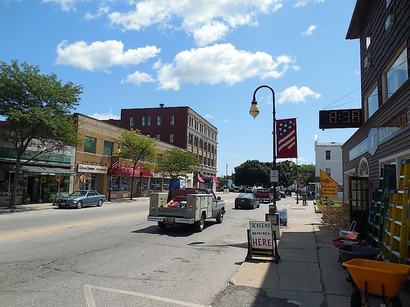 Main Street in Sanford, Maine, featuring a mix of local shops, businesses, and historic buildings that contribute to the small-town charm of this New England community.