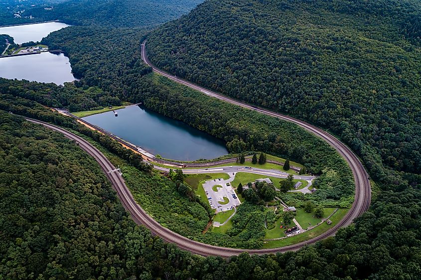 Horseshoe Curve in Altoona, Pennsylvania, is a historic railway curve that winds through a mountainous landscape.