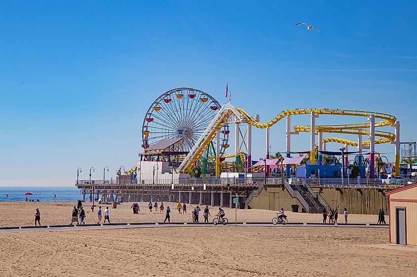 The ferris wheel and roller coaster rides at the Santa Monica Pier.