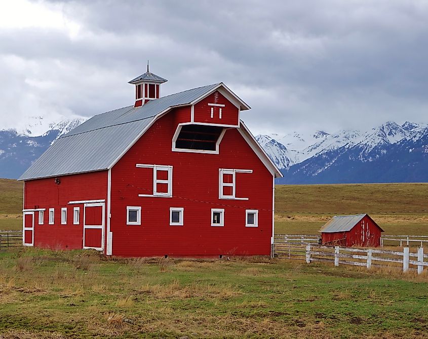 A red barn and Wallowa Mountains near Enterprise, Oregon.