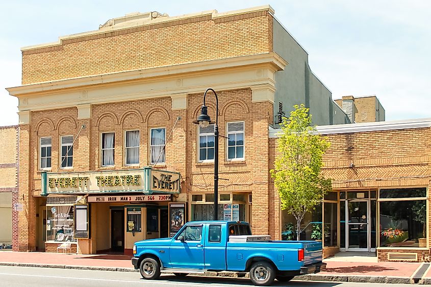 Blue pick-up truck in front of the Everett Theatre in Middletown, Delaware.