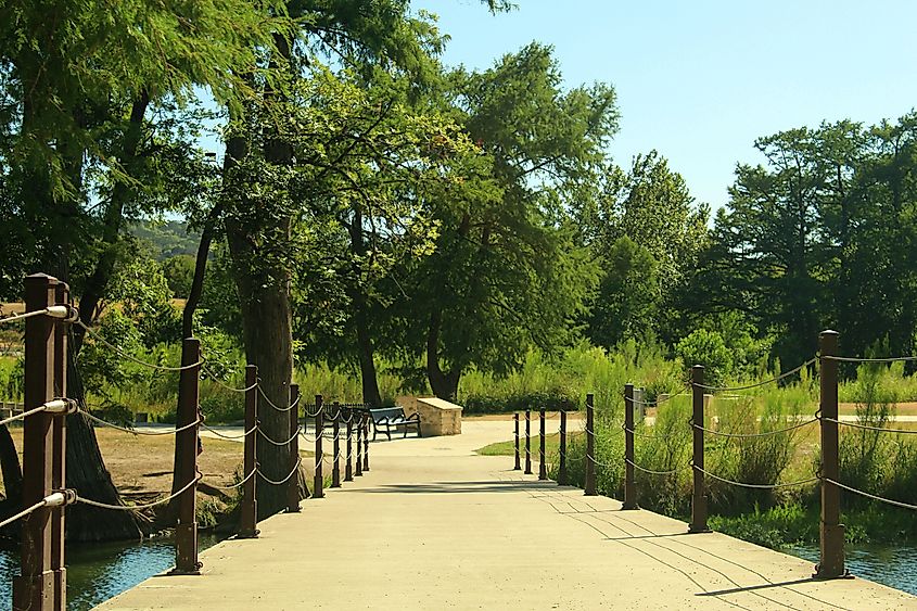 View of a bridge crossing the Guadalupe River in Kerrville, Texas